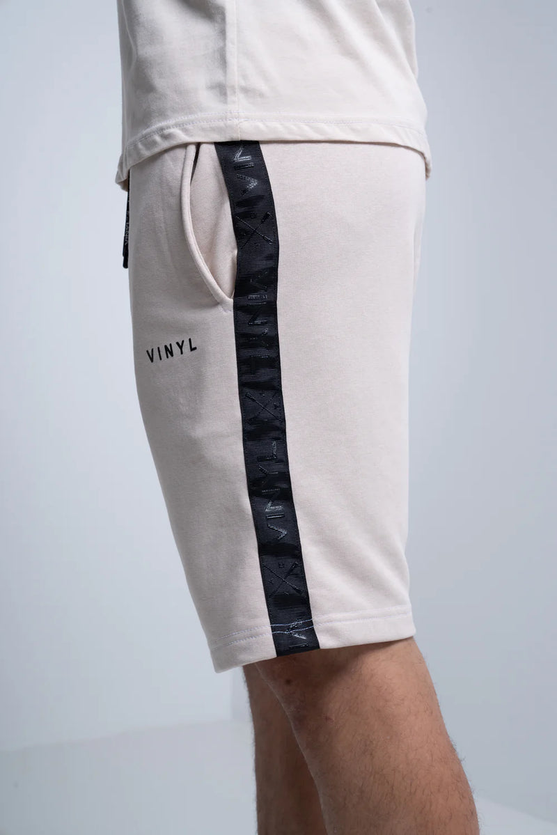 Vinyl art clothing shorts with logo tape - beige